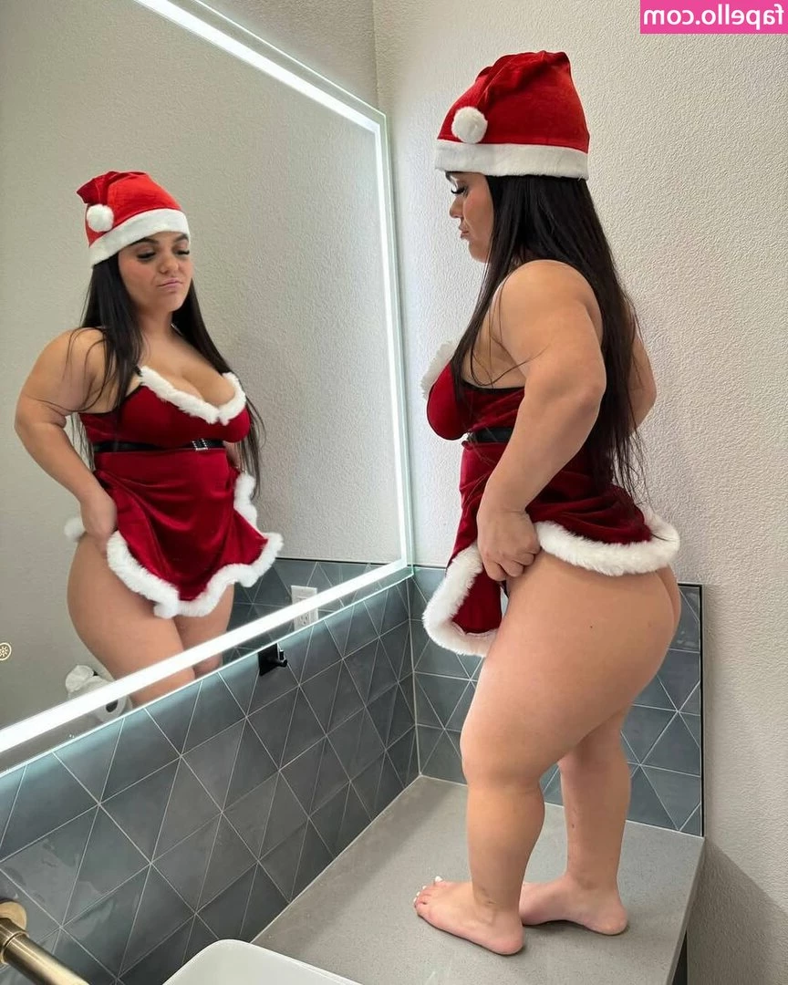 Meg Banks [ meg-banks-3 ] - stockings and heels always appropriate…even with a swim costume!